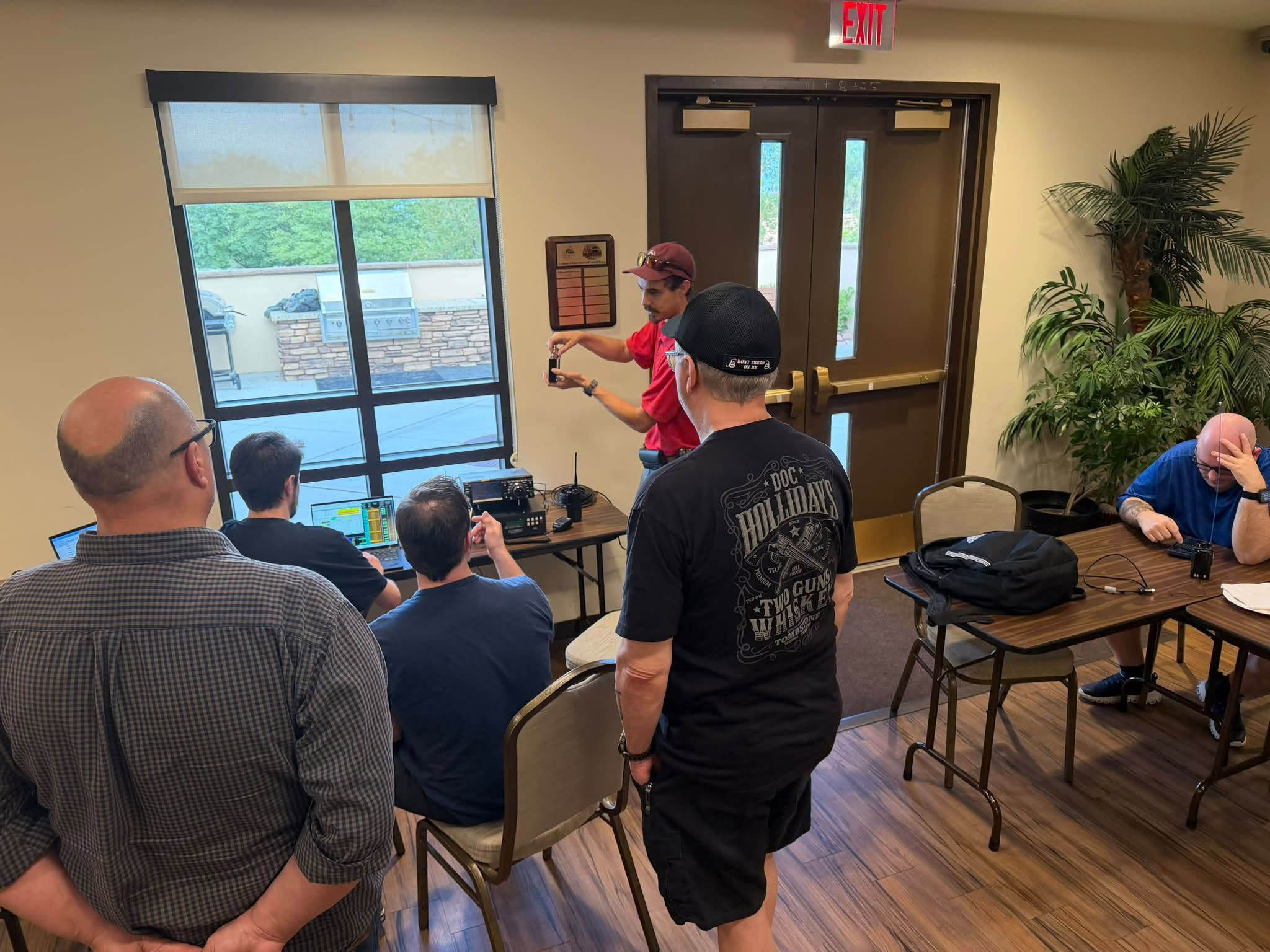 Amateur radio operators learning together at a Sin City Repeater Group activity