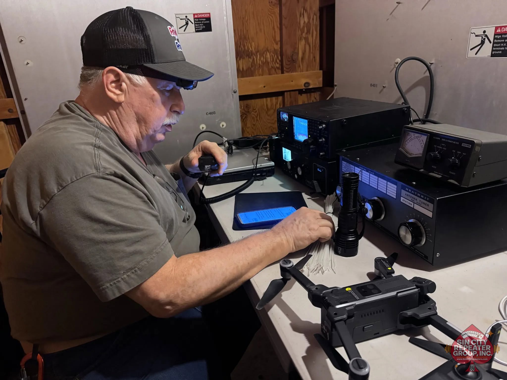 Amateur radio operator using HF radio equipment at the former KXNT-AM transmitter facility in Las Vegas